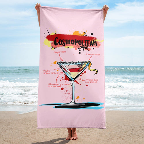 Woman holding light pink cosmopolitan beach towel