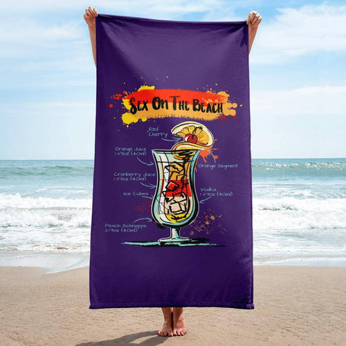 Woman holding purple sex on the beach towel