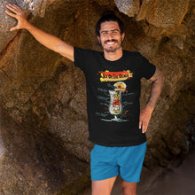 Load image into Gallery viewer, Man standing in front of a cave wearing our t-shirt with Sex on the Beach cocktail sketched on it